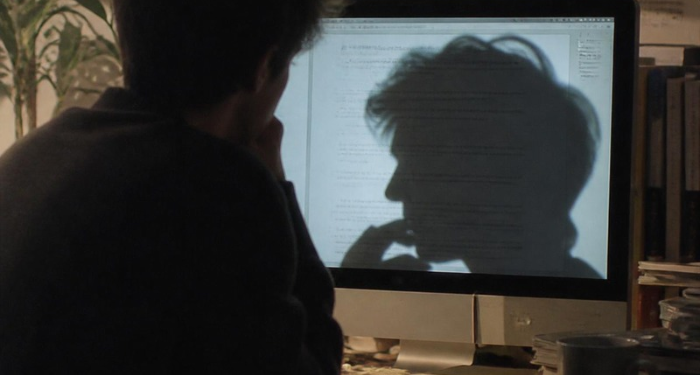Dark Shadow on Computer Screen